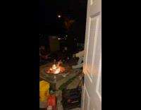 Girl knocks and opens door held up open 