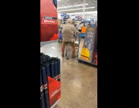 Person sitting on cane as a chair between butt