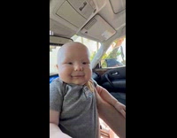 Baby keeps on laughing when asked why