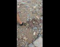 Rock kick and gets shattered in slow motion