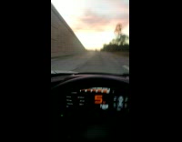 POV mclaren sports car speeding high way 