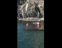 Man white polo wet photo shoot beach side