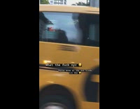 man in skin suite dancing on nyc street