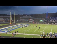Crowd on football game leaving because of storm 