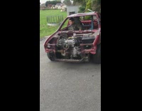 Guy driving car without windows scares horse 