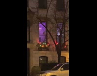 Collab winy - Person stands and rides swing inside apartment 