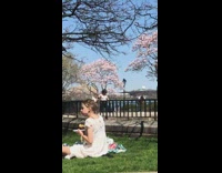 Lady Tries to Take Photos of Herself at Park