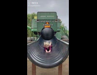 Kids Slide Down on Tractor-Themed Slide