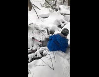 Guy tries to jump over creek fail