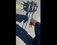 Man nervous cutting zip ties on spring