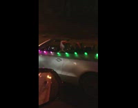 Guy drives Christmas light car 