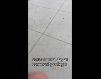 Man holding out doors for fellow students 