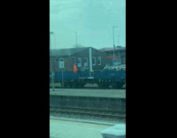 Man walk on train platform with another man
