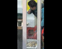 Man brush teeth spits water on fish