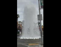 Woman photo shoot broken pipe water flow