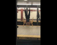 Collab Subway Creatures - Man upside down between two wooden chairs