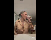 Collab BSMedia - Girl in beige blouse chugs a whiteclaw