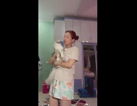 Girl tells angry cat i love you 