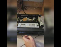 VHS Player opened and filmed the inside process