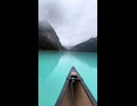 Collab Clips MPUGC - Man enjoys canoeing at Banff lake 