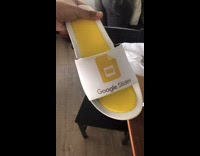 guy shows google brand white and yellow slides