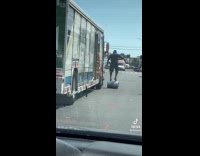 Man roll and balance on keg barrel