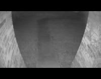 Shadow moves around on top of the doorway near the security camera