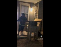 Girl on all fours barking at stranger 