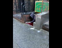 Guy uses knife to cut snow 