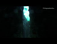 Guy scuba dives underwater flippers yellow goggles 