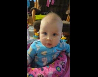 Baby girl reacts on last food bite