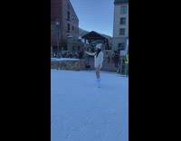 Woman white beanie sweater boots selfie snow