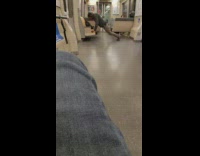 Guy does push-ups on train seat