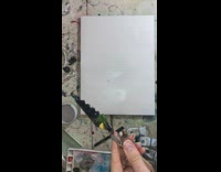 Artist does watercolor tree painting 