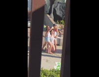 Woman Budweiser bikini kneel wet photo shoot