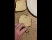 Guy remove hard burnt piece of bread