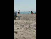 Two women bikini different photo shoot beach