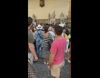 Man in sunglasses twerks on the orchestra concert