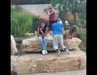 2 guys dance to musician while girl reacts