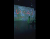 Girl long skirt slow steps Van Gogh exhibit