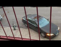 Black car with interesting pull out technique from parking