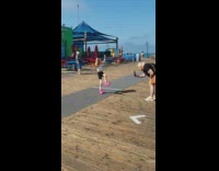 Kid in pink shoes tiktok dance at the docks