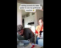 Guy pretends to see spider scares girlfriend 