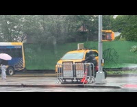 Taxi parked on street keeps on bouncing