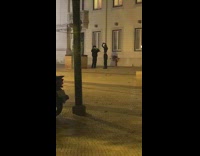 Man and woman tiktok dance at the sidewalk