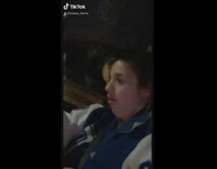 Blue jacket girl gags dry heaves car