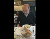 Impatient man cant wait for hot bread to cool