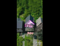 Guy uses computer mouse on wall house 