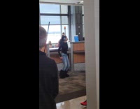 Girl records a video of herself at the terminal 