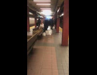 (DUPLICATE) Homeless person spraying air freshener around hobo fort in subway